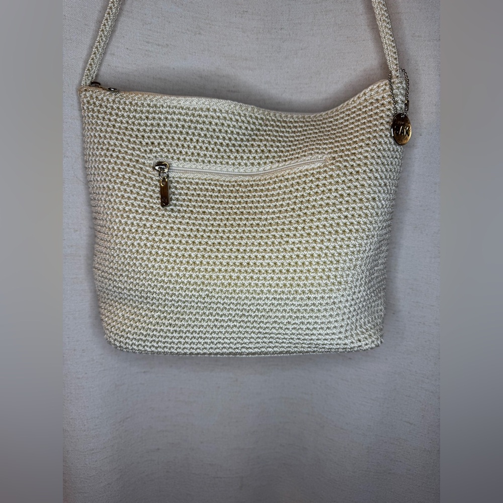 The Sak Cream Woven Shoulder Bag with Gold Accent